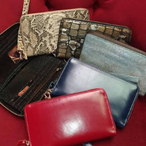 A collection of small handbags and clutches.